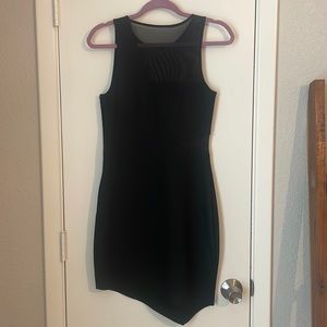 Express black dress with sheer cutout accents. Asymmetrical hem.